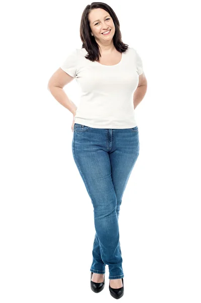 Woman with hands behind her back — Stock Photo, Image