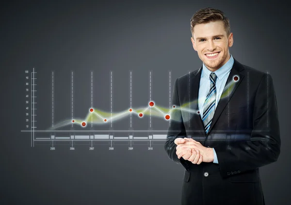 Business man with digital graph report — Stock Photo, Image