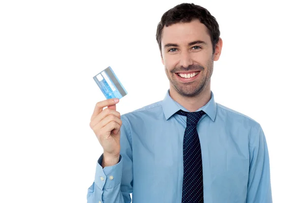 Business executive holding credit card Royalty Free Stock Photos