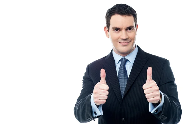Handsome businessman holds his thumbs up — Stock Photo, Image