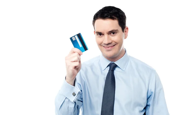 Corporate man holding debit card — Stock Photo, Image