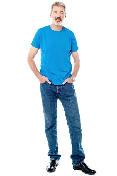 Senior man with hands in pockets — Stock Photo, Image