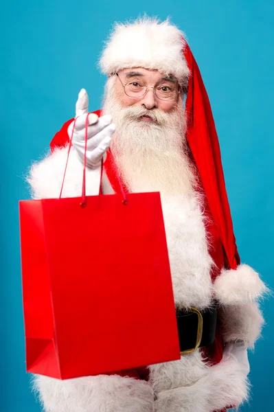 Santa geven van geschenken — Stockfoto