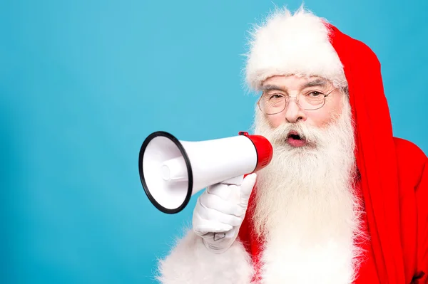 Santa claus spreken over loudhailer — Stockfoto