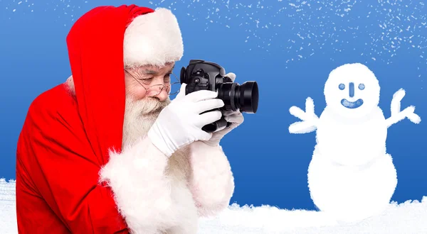 Santa nemen foto — Stockfoto