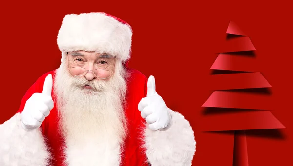 Santa claus giving thumbs up — Stock Photo, Image