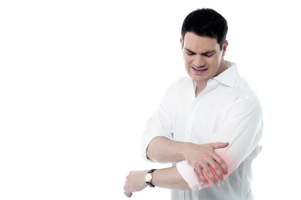 Man having pain in his elbow — Stock Photo, Image