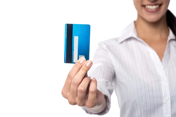 Woman showing credit card Royalty Free Stock Images