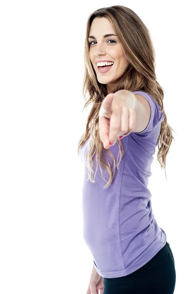 Trendy girl pointing towards you — Stock Photo, Image