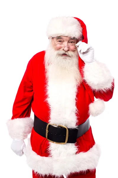 Santa Claus adjusting spectacles — Stock Photo, Image