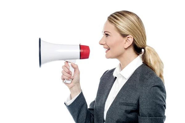 Corporate woman with loudhailer — Stock Photo, Image