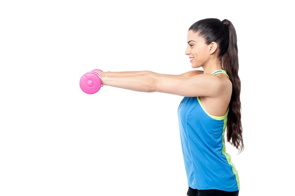 Fitness woman lifting dumbbells — Stock Photo, Image