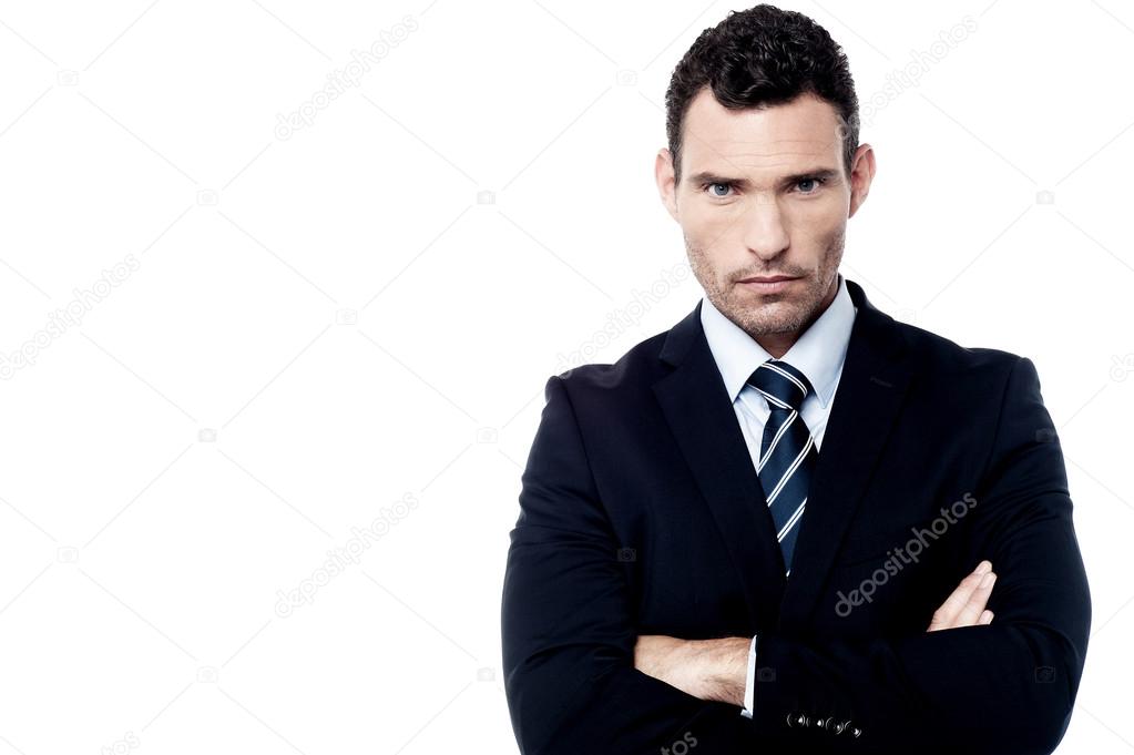 Businessman with arms folded