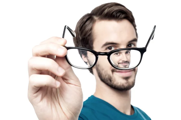 Man looking through the glasses — Stock Photo, Image