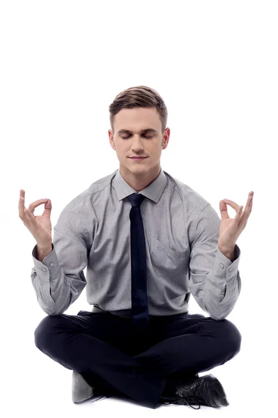 Business man meditating — Stock Photo, Image