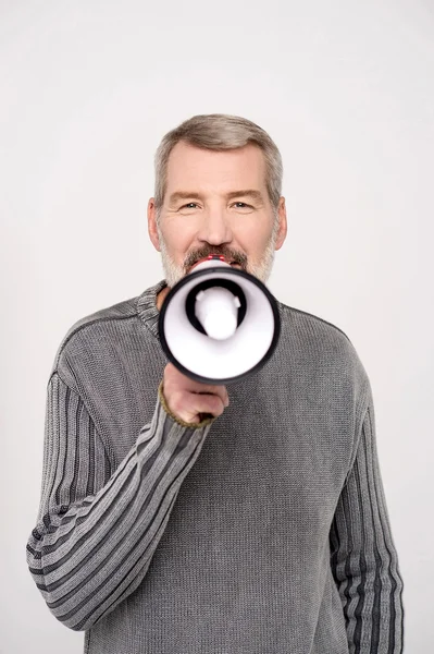 Man proclaiming into the loudspeaker — Stock Photo, Image