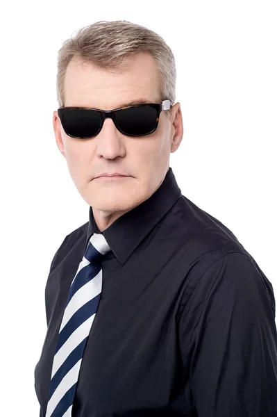 Businessman posing with sunglasses — Stock Photo, Image