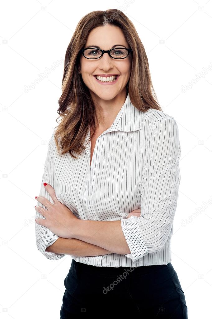 Confident business woman with crossed arms.