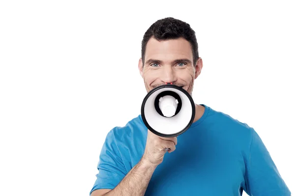 Man proclaiming over megaphone — Stock Photo, Image