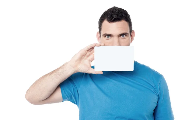 Man cover face with blank card — Stock Photo, Image