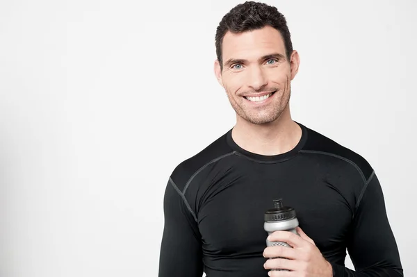 Athlete with sipper bottle — Stock Photo, Image