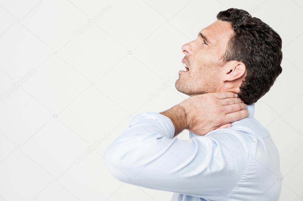 Male having a neck pain