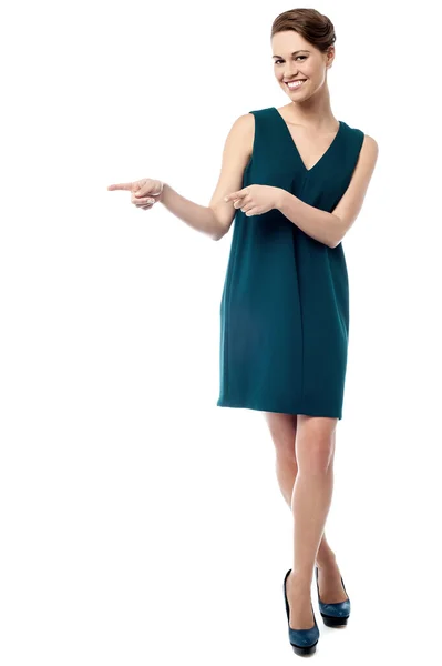 Woman pointing something — Stock Photo, Image