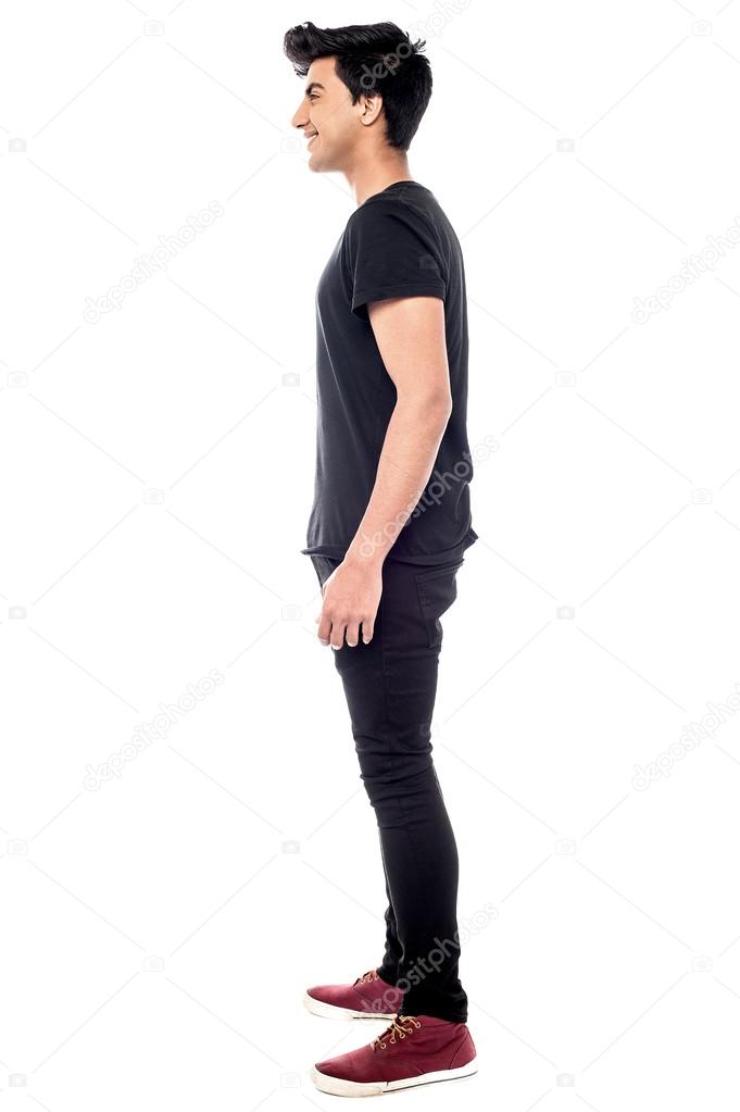 man standing sideways facing right