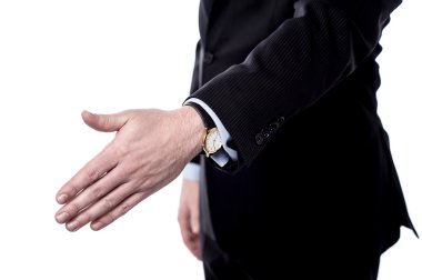 İş adamı elini sıkmak için uzatıyor