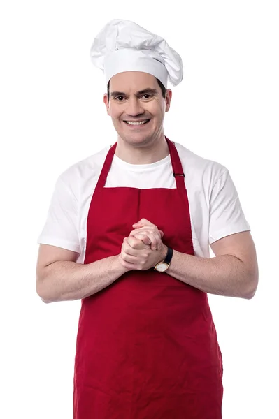 Шеф-повар с сжатыми руками — стоковое фото
