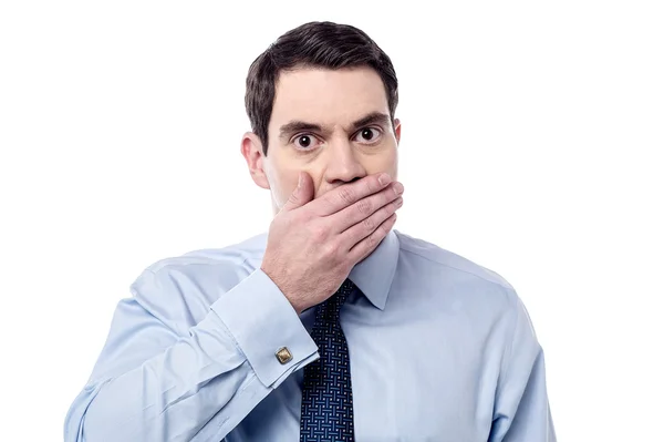 Man covering mouth with hand — Stock Photo, Image