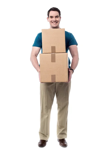 Man holding pile of boxes — Stock Photo, Image