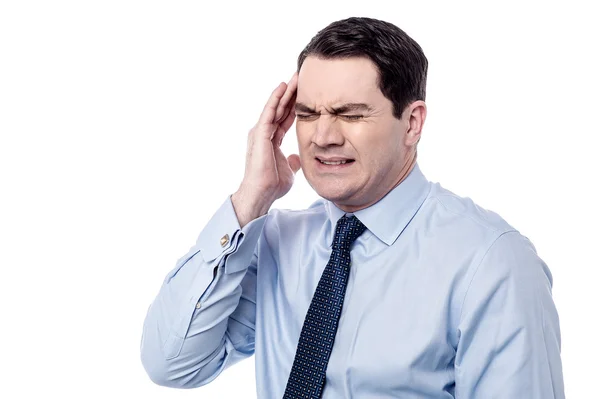 Homem que sofre de dor de cabeça — Fotografia de Stock