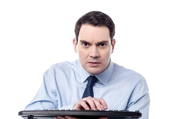 Businessman typing on computer keyboard — Stock Photo, Image