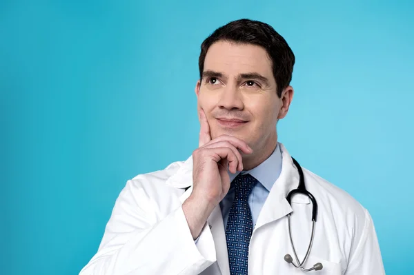 Male physician thinking — Stock Photo, Image