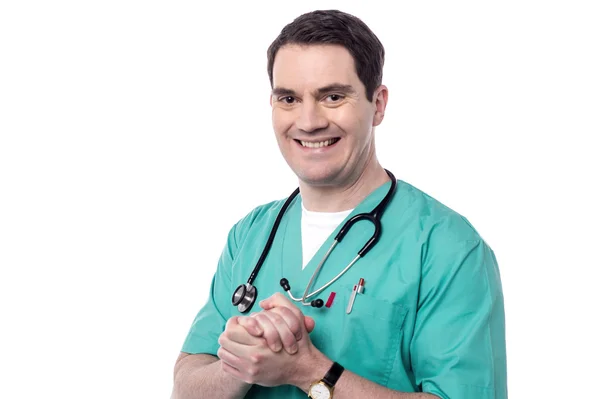 Male doctor with hands clasped — Stock Photo, Image