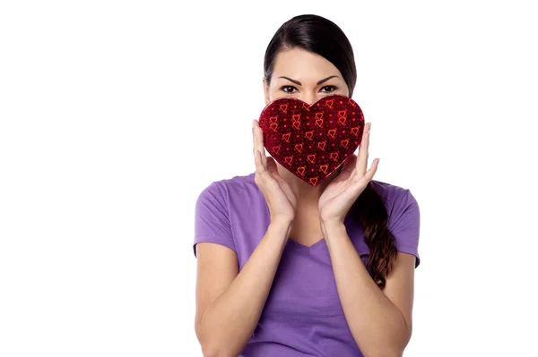 Woman with heart shaped box — Stock Photo, Image