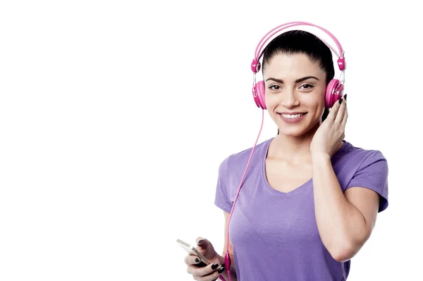 Beautiful woman enjoying music — Stock Photo, Image