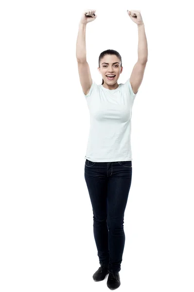 Woman with her arms raised — Stock Photo, Image