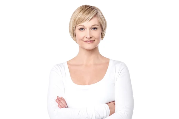 Middle aged woman with folded arms — Stock Photo, Image