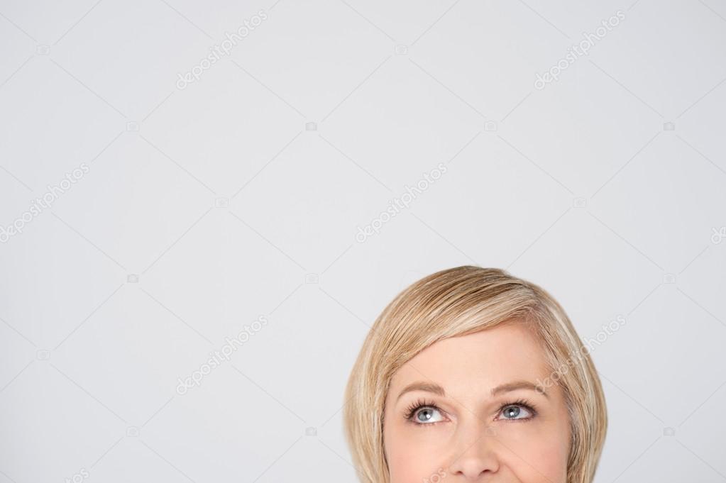 Woman looking upwards