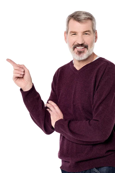 Man pointing to copy space — Stock Photo, Image