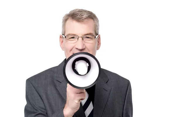 Empresario hablando en un megáfono — Foto de Stock