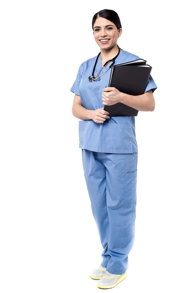 Female doctor with patient reports — Stock Photo, Image