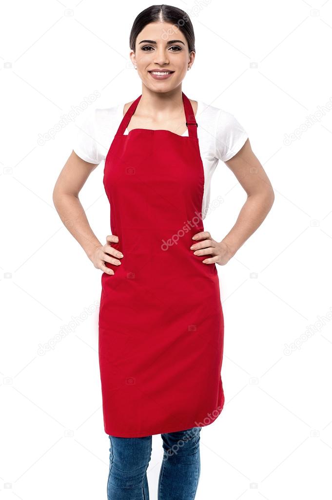 Female chef with hands on waist