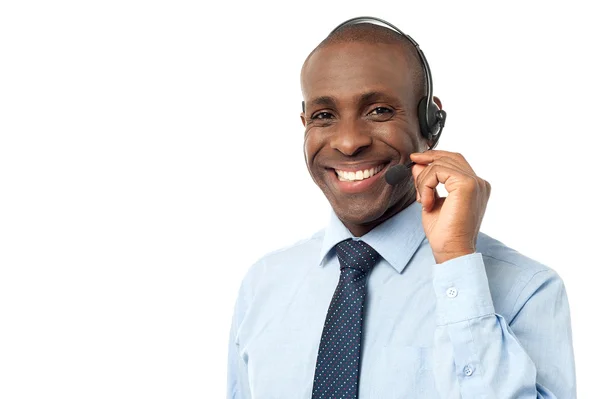 Empresário posando com fone de ouvido — Fotografia de Stock