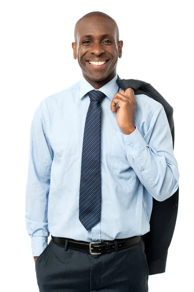 Businessman with jacket over shoulder — Stock Photo, Image