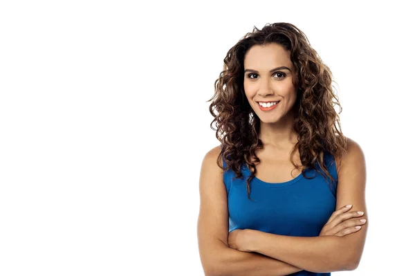 Woman posing with folded arms — Stock Photo, Image