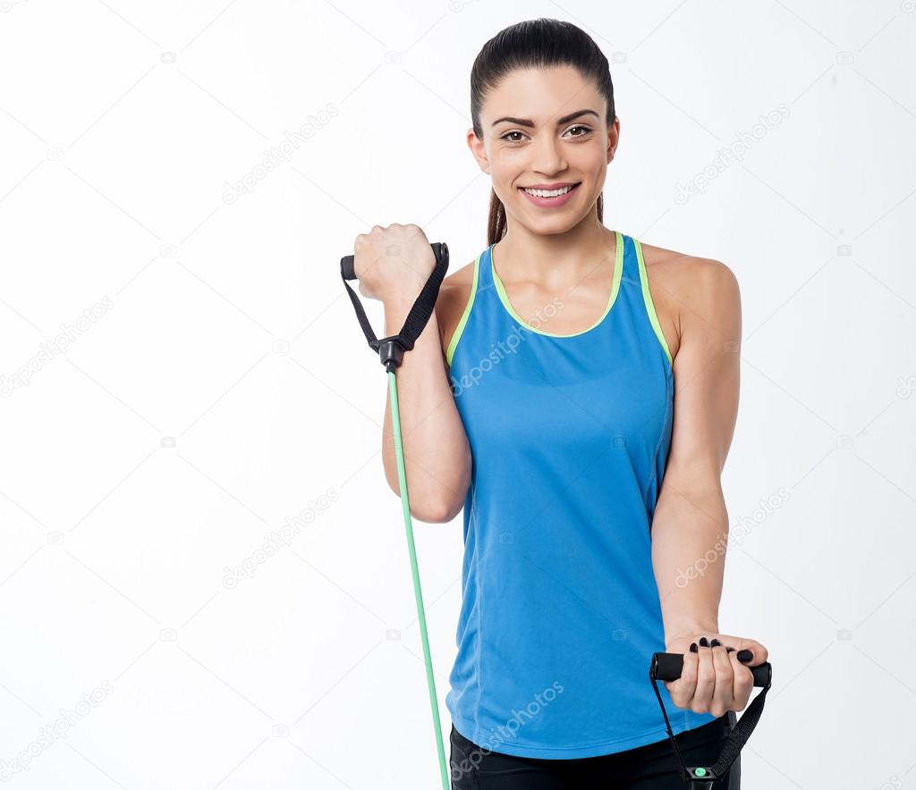 Woman using resistance band