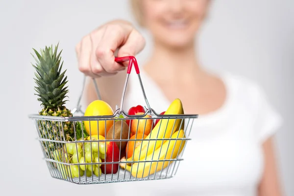 Woman showing shopping cart — Stock Photo, Image